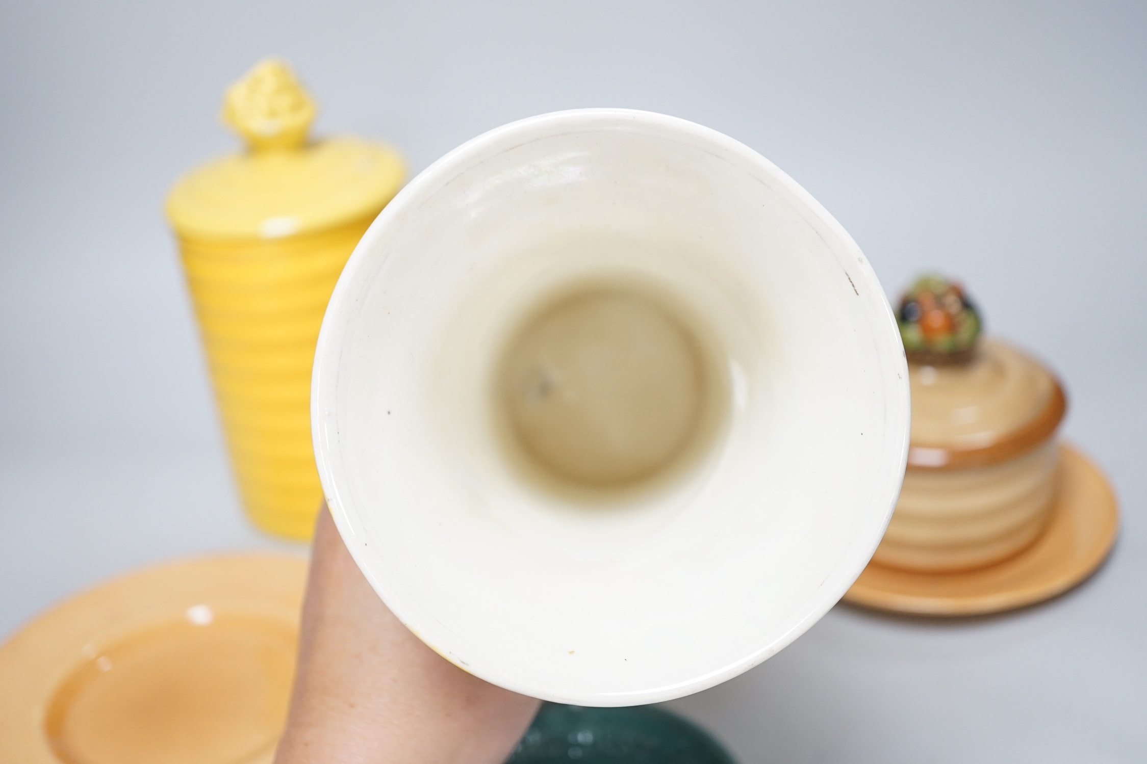 A collection of Ashstead pottery, 1920’s/early 1930’s, together with a large pottery vase and a lustre vase decorated with a crinoline lady, the largest 20cm high